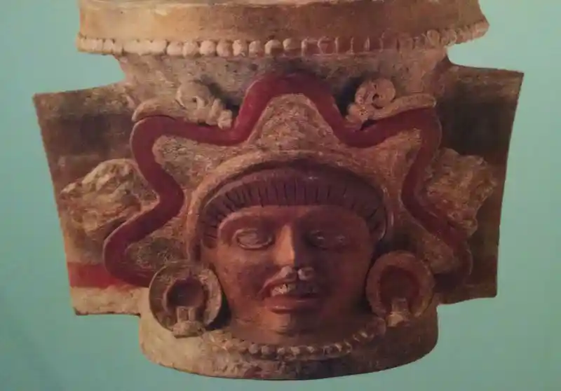 Ceramic incense burner with solar rays on the head